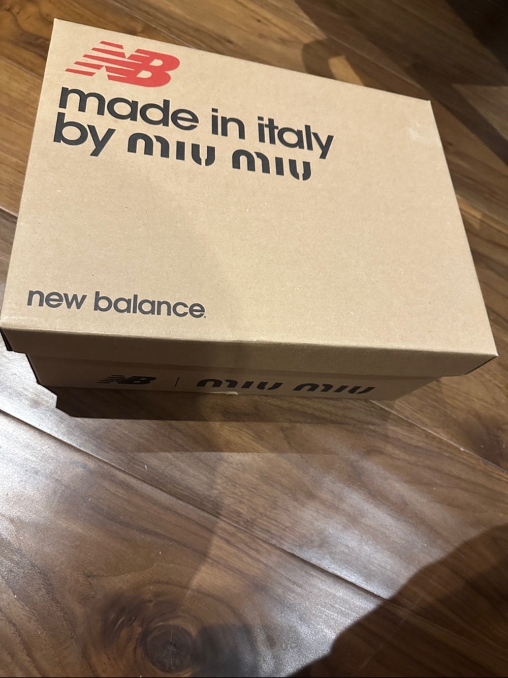 Miu Miu collaboration with New Balance Box with Black and Red Logo